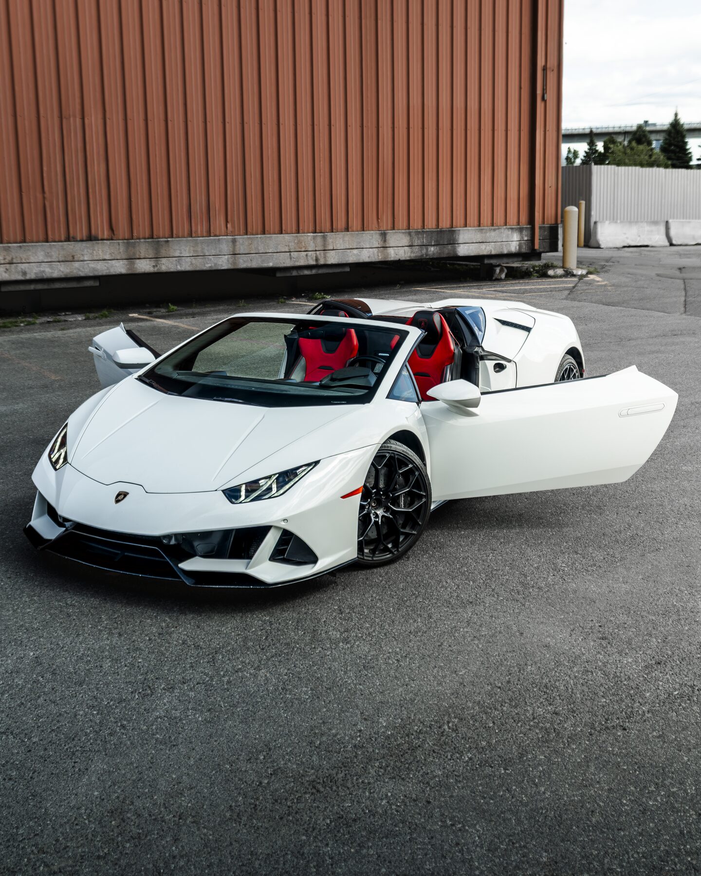 White Lamborghini Huracán EVO Spyder, doors open
