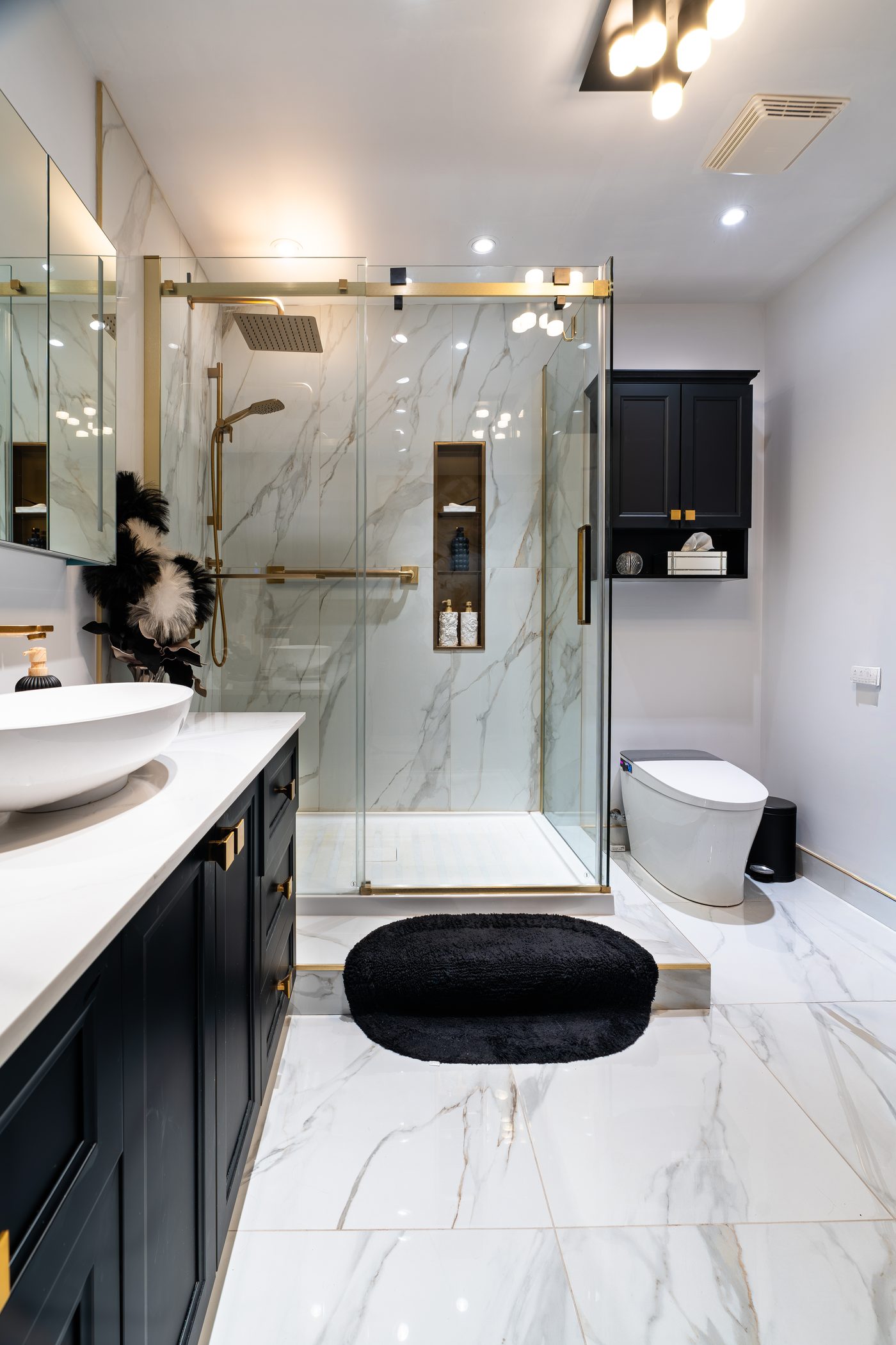 Marble and brass bathroom renovation, photographed by HAS Production
