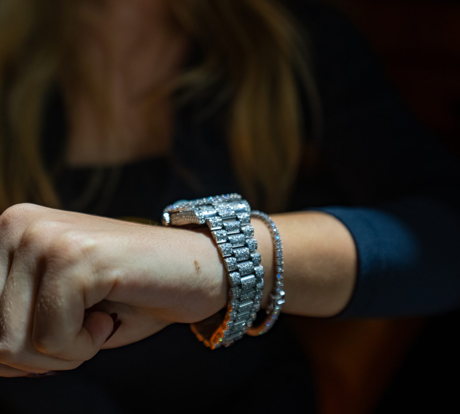 Diamond-set bracelet and tennis bracelet, low light